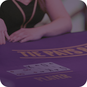 Live Baccarat: Experience the suspense of predicting the winning hand.